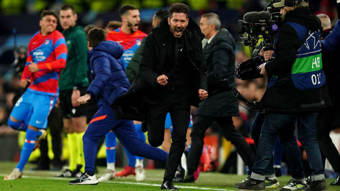 Diego Simeone celebrates Atletico Madrid’s win at Manchester United